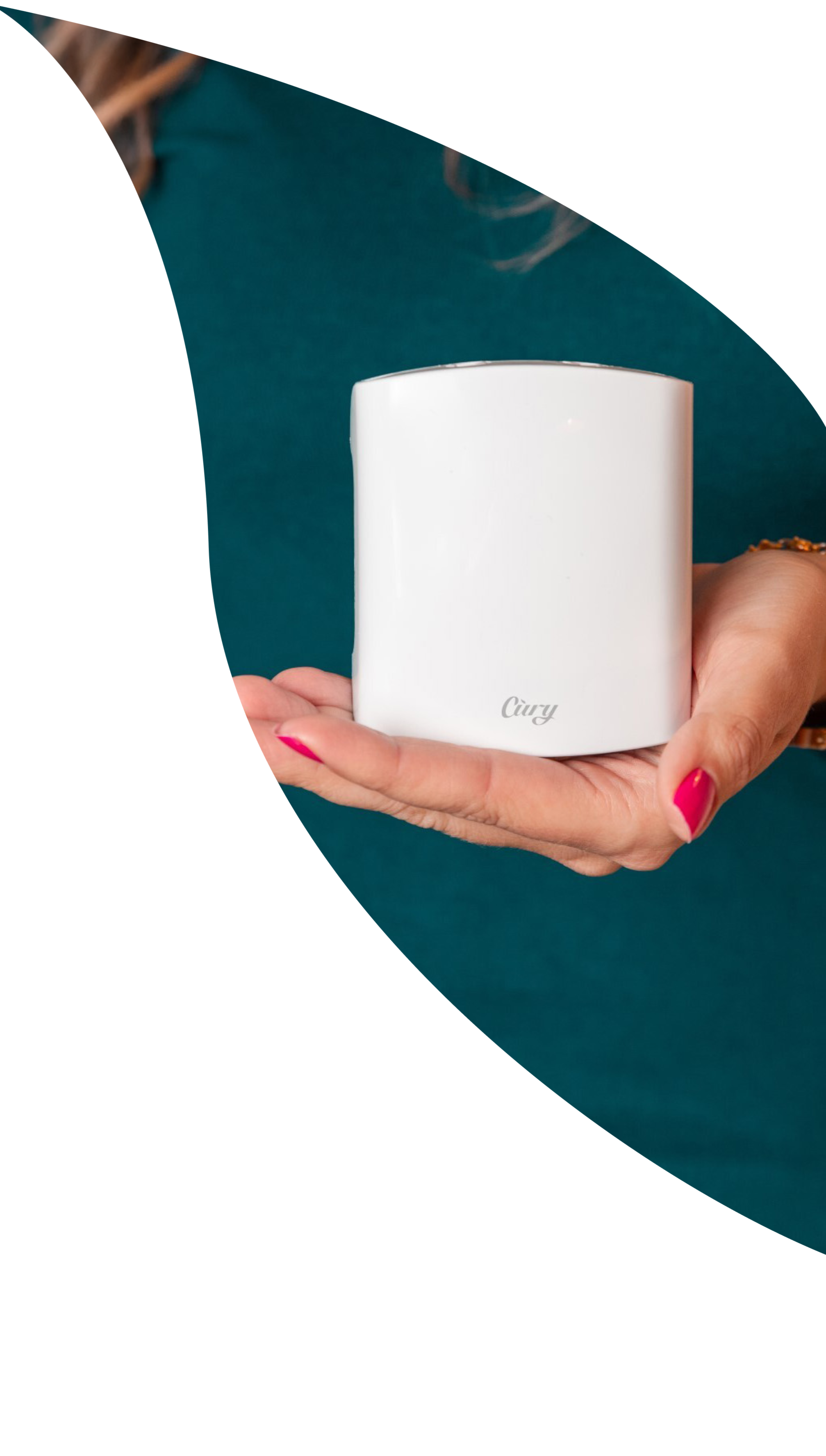 A person with pink nail polish holds a white cylindrical object labeled Oray in one hand against a teal background.